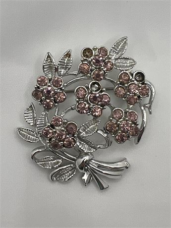 Purple rhinestone and silvertone brooch