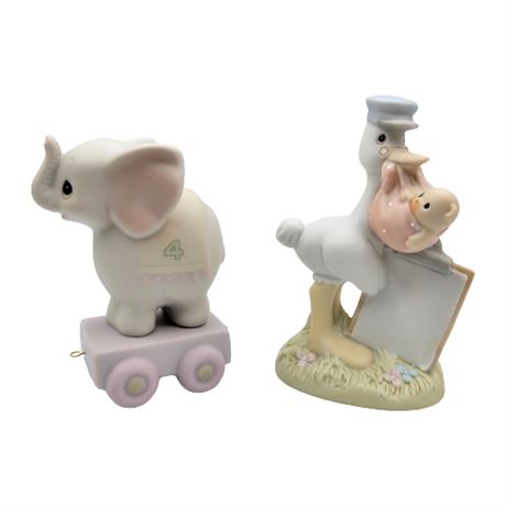 Pair of Precious Moments Figurines