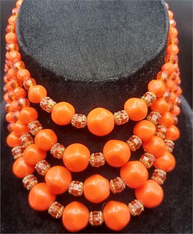 Vintage four strand orange cased bead necklace