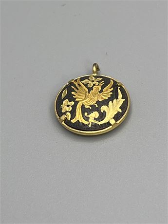 Vintage gold filled and black Onyx dramascene design pendant