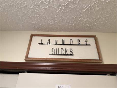 "Laundry Sucks" Sign