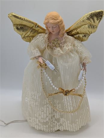 Porcelain face white angel tree topper lights up