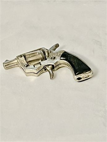 Small midget, heavy metal cap gun