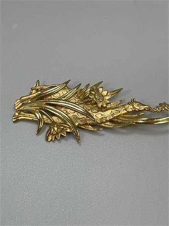 Balencigna  flowered, gold tone brooch