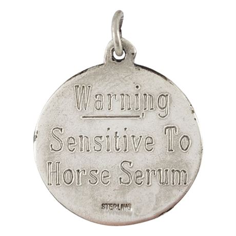 Vintage Sterling Silver "Warning" Pendant
