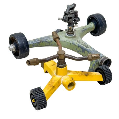 Pair of Vintage Metal Wheeled Impact Sprinklers