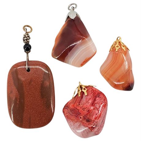 Four Vintage Genuine Stone Pendants