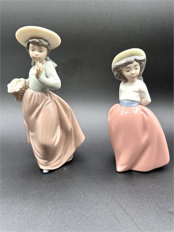 Two Nao by Lladro Figurines “Out for a stroll” and "Girl on Placid Walk"