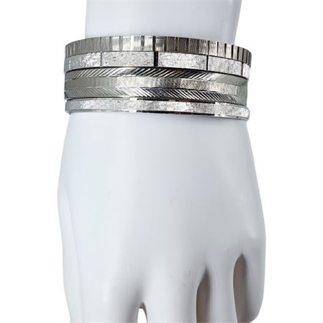 Four Silver Tone Bangle Bracelets