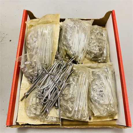 Hundreds of NOS Battery Hold Downs