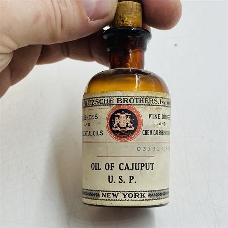 Antique Fritzsche Bros Oil of Cajuput Bottle w/ Paper Label