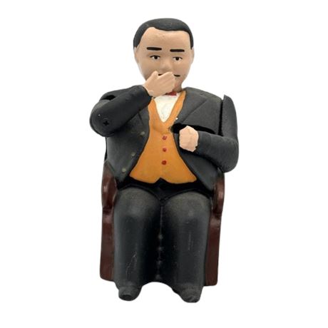 Cast Iron Man in Chair Bank