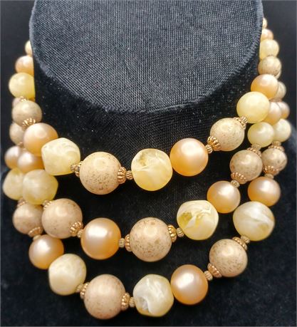Beautiful three strand cream/gold/light pink bead necklace