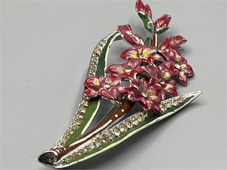 Rhinestone and enamel signed, flowered brooch