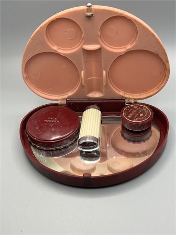 Bakilte makeup box with face powder, lipstick and eyeshadow