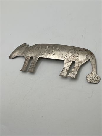 Folk art silver animal brooch