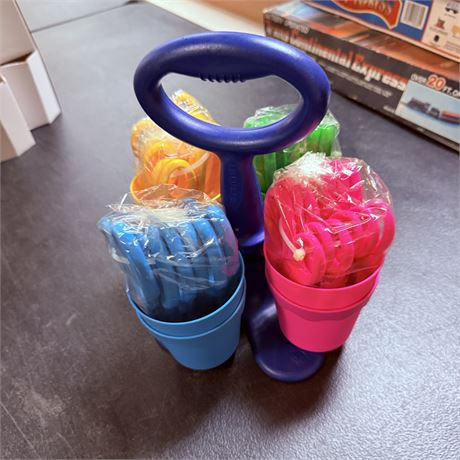 2 New Scissor Caddies w/ 24 Scissors Each