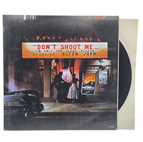 Elton John "Don't Shoot Me, I'm Only the Piano Player" 1972