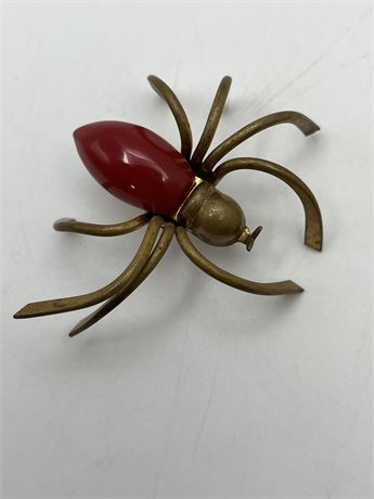 Red Bakelite spider brooch
