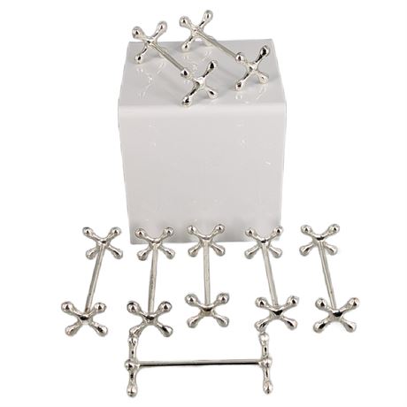 Lot 8 silver tone knife rests